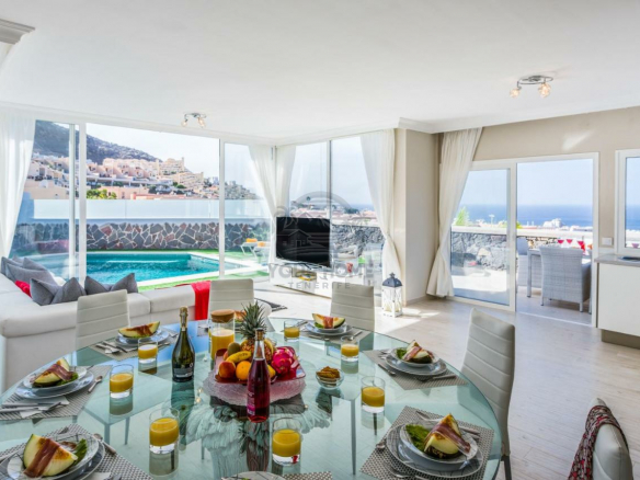 Ingatlanvásárlás Tenerife - Álmai Otthona a Gyönyörű Szigeten Tenerife az ingatlanvásárlók paradicsoma, különösen, ha luxus otthonra vágyik. Cégünk segít Önnek megtalálni az ideális ingatlant Tenerife csodálatos szigetén.