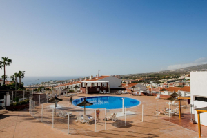 Tenerife Property for Sale with Community Pool. Immerse yourself in luxury with a Tenerife property featuring a community pool.